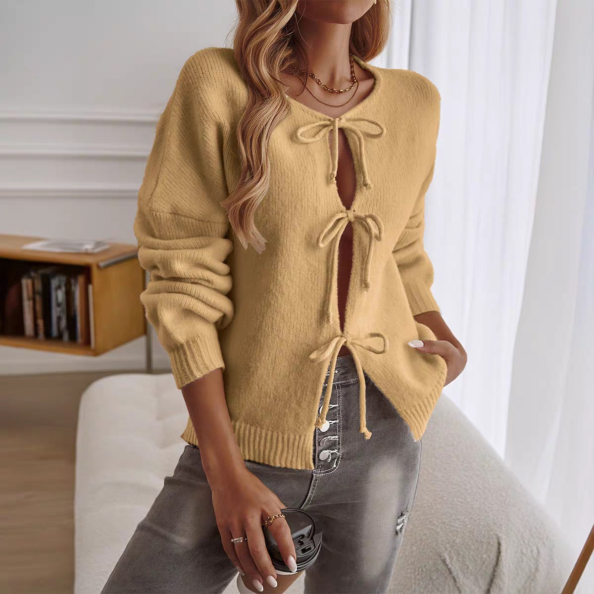 Pullover fiocco