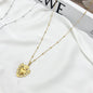 Collana lunga cuore sacro